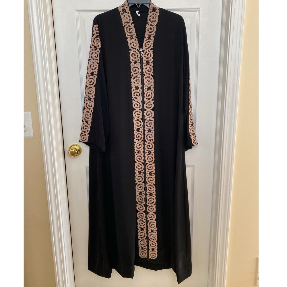 Women’s dress with embellished studs. Size 6 made in Jordan.